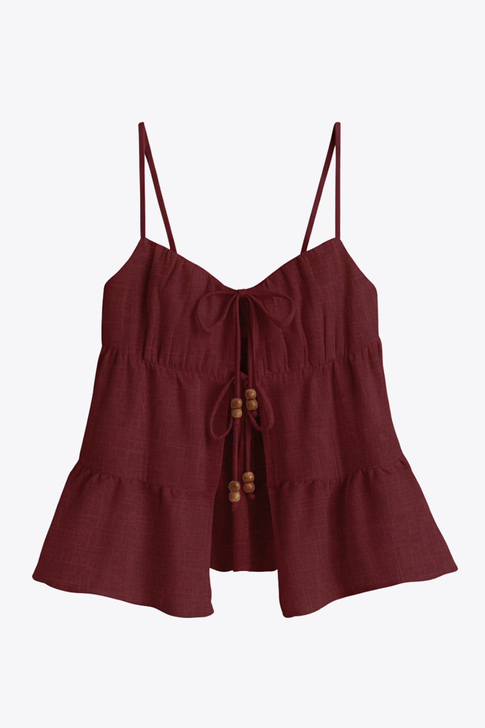 Top de lino, tirantes delgados ajustables, corte en a, capas con olanes en bajo, escote v redondeado con plisados y cut out, abertura frontal y cierre con lazos amarrables. Detalle de fruncido en espalda y detalle decorativo en lazos.