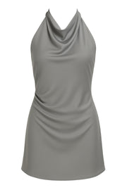 Vestido corto de cuello halter con lazo amarrable posterior, escote fluido, fit recto y escote en espalda.